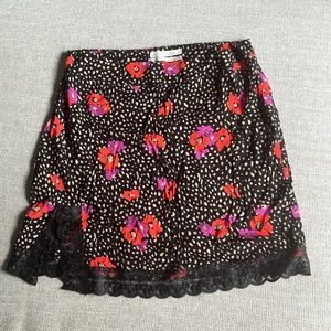 Small Urban Outfitters skirt with lace trim/slit. Never worn out.